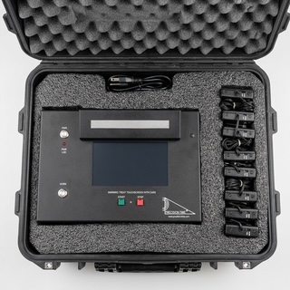 an image of the Impresso case, a black case that contains the belt packs and the control board